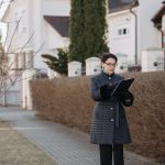 Woman In Eyeglasses Checking The Documents She Is Holding 7937222 150x150